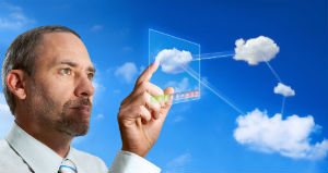 Man working with virtual cloud computer